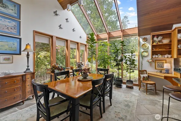 a view of an outdoor dining space with furniture