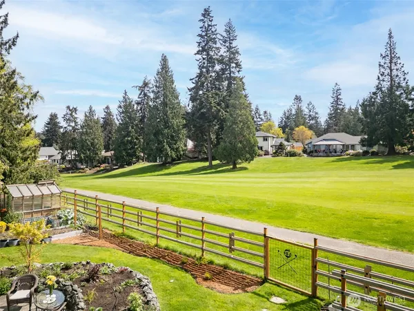a view of an ocean and a yard