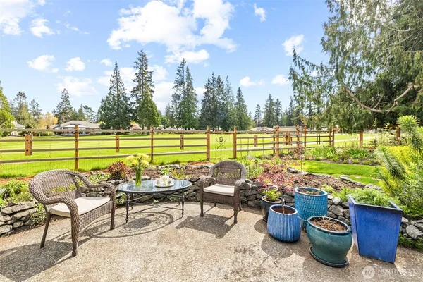 a view of a garden with patio
