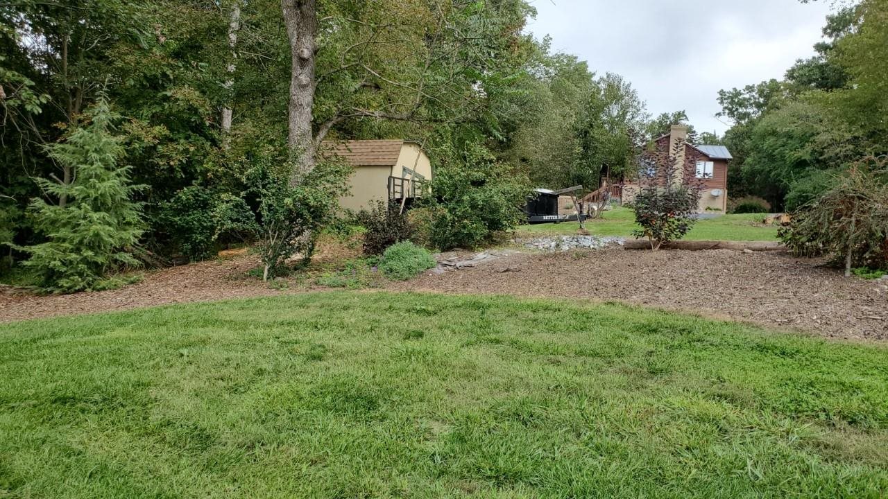 6565 Faughts Road Mount Crawford, VA 22841 - Photo 21 of 39 a view of a house with a backyard