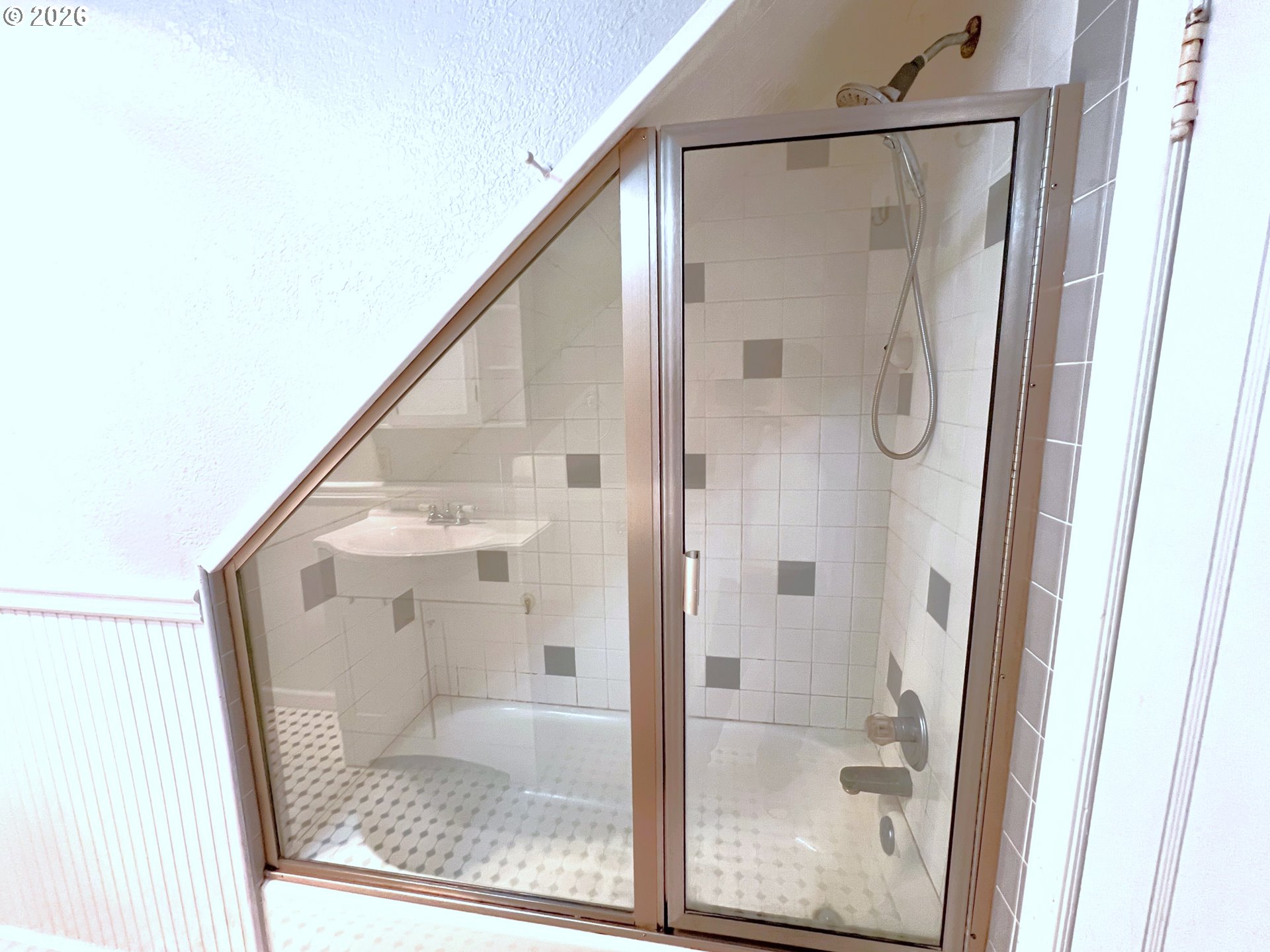 1092 Lewis Street North Bend, OR 97459 - Photo 23 of 43 a bathroom with a glass shower door