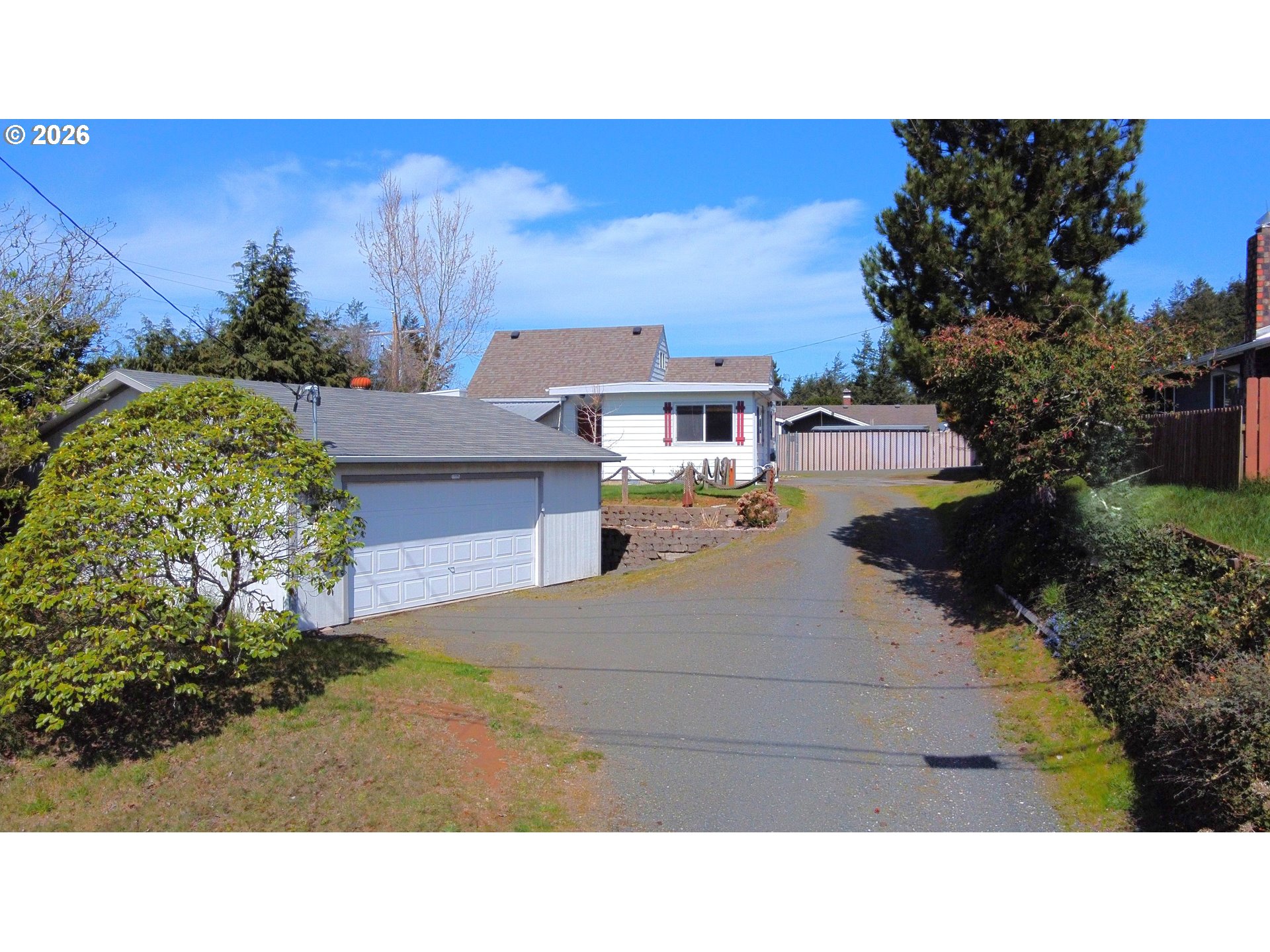 1092 Lewis Street North Bend, OR 97459 - Photo 33 of 43 a black and white photo of a house