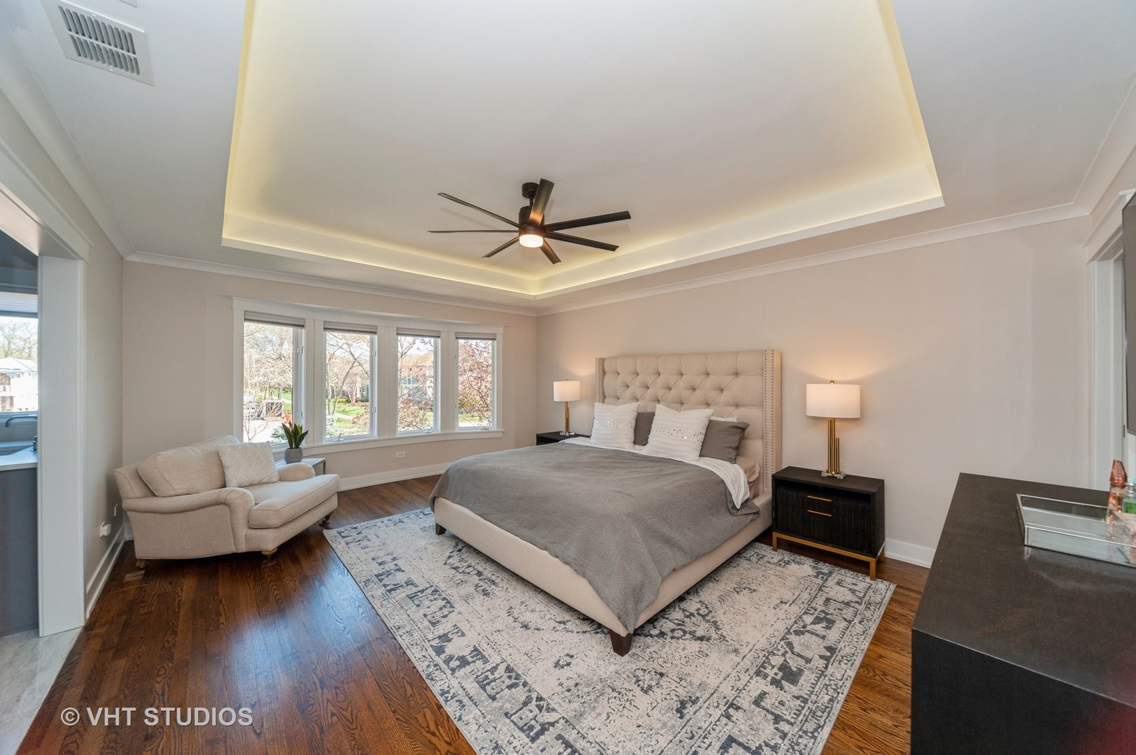217 Devon Avenue Park Ridge, IL 60068 - Photo 12 of 28 a bedroom with a large bed and a couch