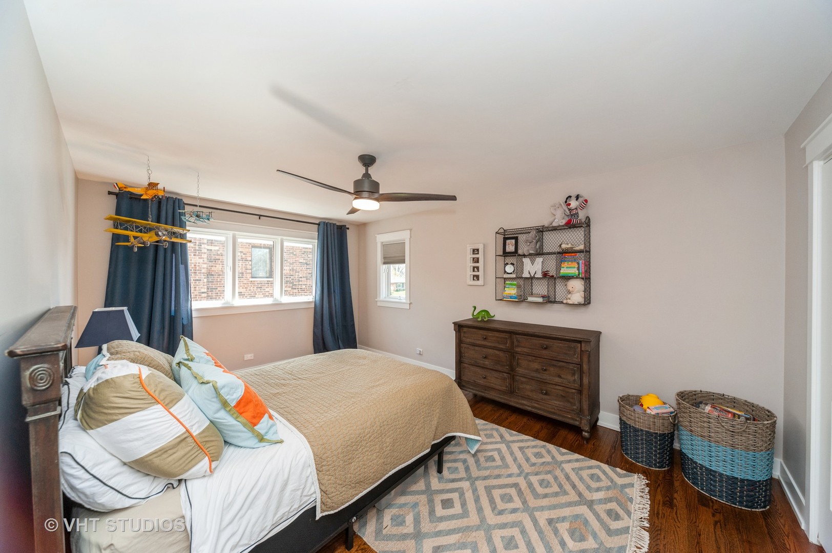 217 Devon Avenue Park Ridge, IL 60068 - Photo 17 of 28 a bedroom with a bed and furniture