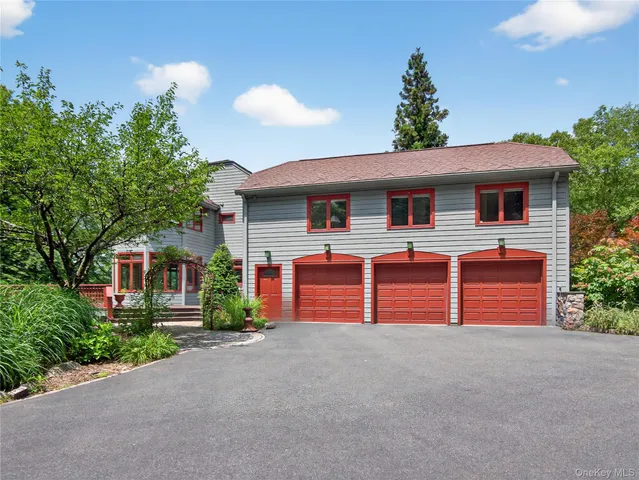 a front view of a house with a garage