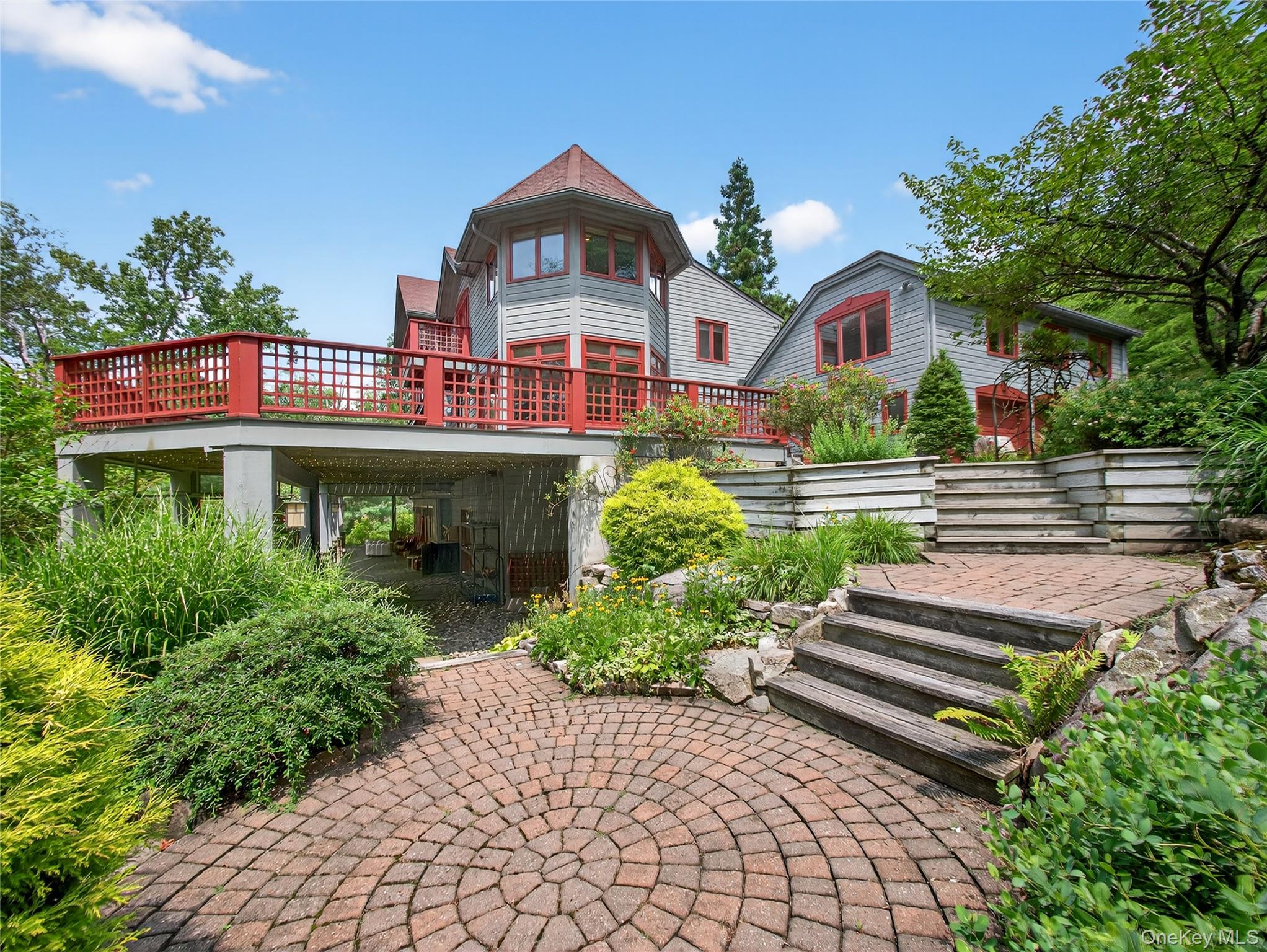 6 Old Cranberry Road Sloatsburg, NY 10974 - Photo 10 of 13 Rear view of house featuring a wooden deck and a patio area