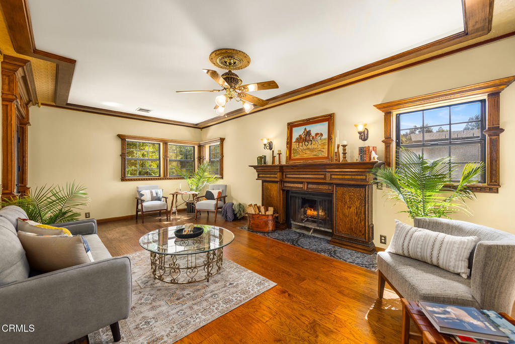 10484 Creek Road Oak View, CA 93022 - Photo 15 of 52 a living room with furniture a window and a fireplace