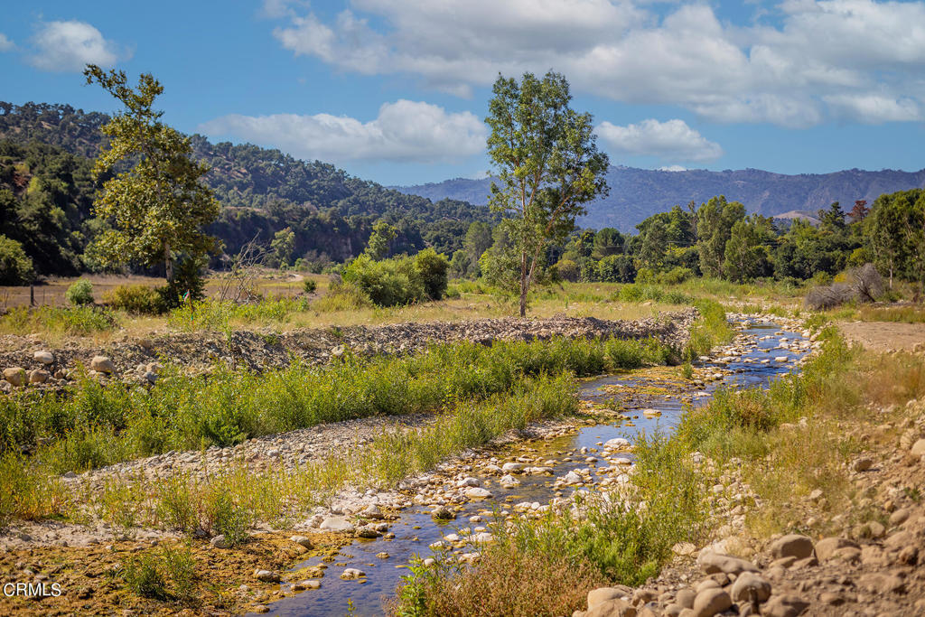 10484 Creek Road Oak View, CA 93022 - Photo 24 of 52 a view of a yard with a lake view