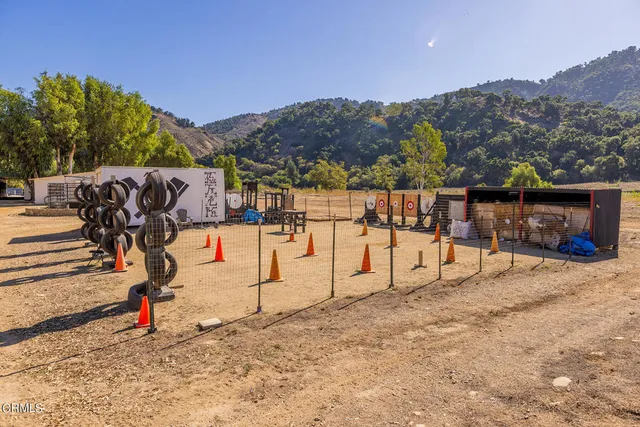 a view of a garage with gym equipment