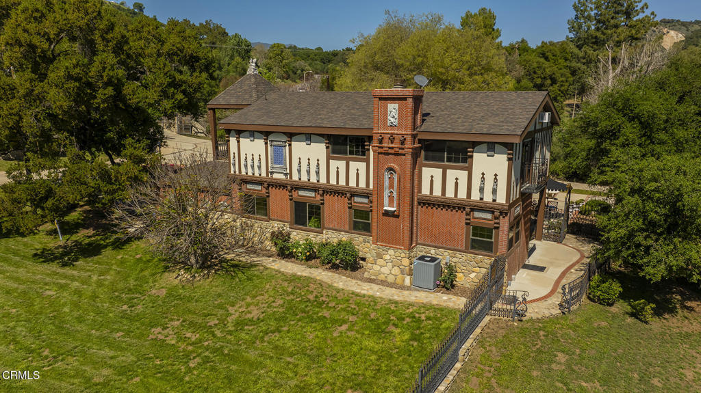 10484 Creek Road Oak View, CA 93022 - Photo 46 of 52 an aerial view of a house with swimming pool and garden