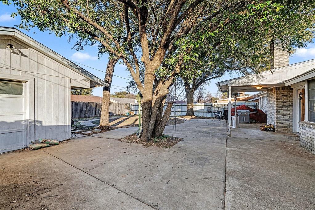 6013 Robin Drive Watauga, TX 76148 - Photo 27 of 30 Fenced backyard with a patio