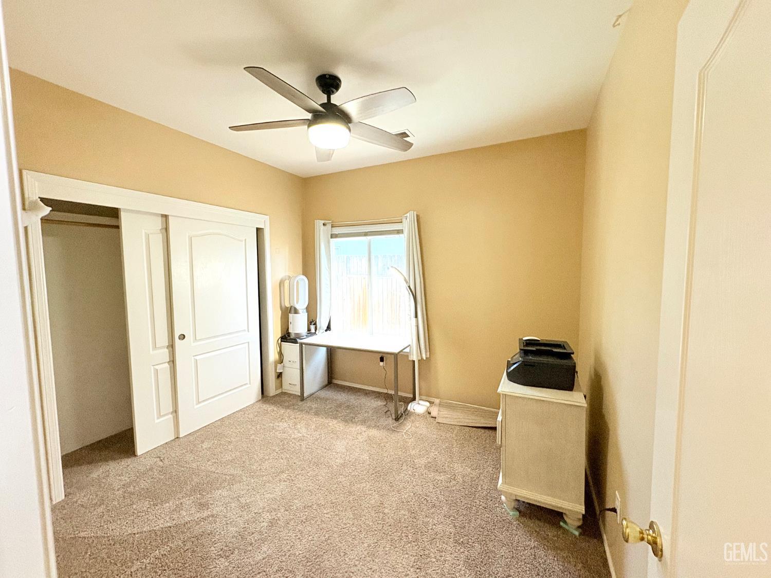 Undisclosed Address Bakersfield, CA 93311 - Photo 8 of 19 a living room with furniture and a window