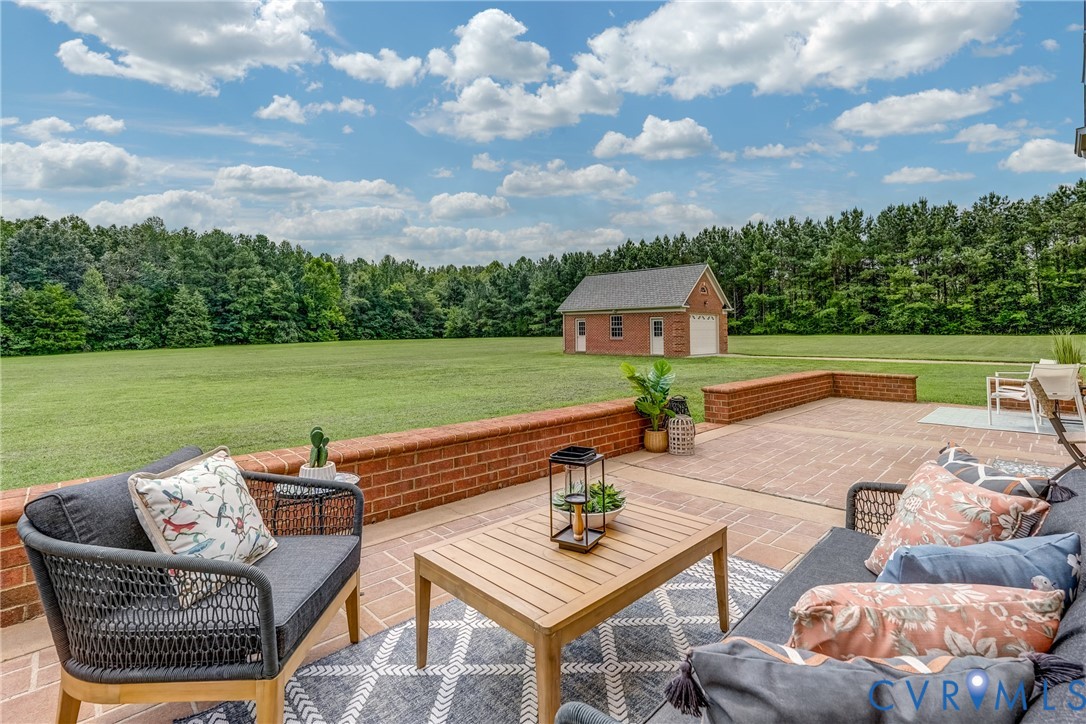 15154 Locust Level Drive Doswell, VA 23047 - Photo 11 of 48 an outdoor sitting area with furniture and garden