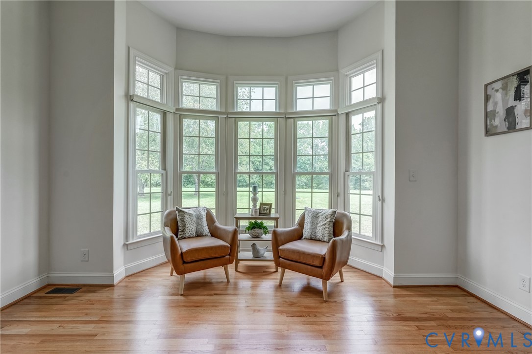 15154 Locust Level Drive Doswell, VA 23047 - Photo 26 of 48 a living room with furniture and a large window