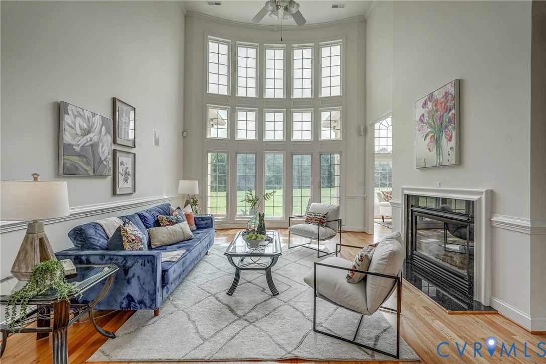 15154 Locust Level Drive Doswell, VA 23047 - Photo 28 of 48 a living room with furniture and a fireplace