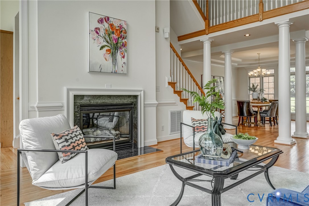 15154 Locust Level Drive Doswell, VA 23047 - Photo 31 of 48 a living room with furniture and a fireplace