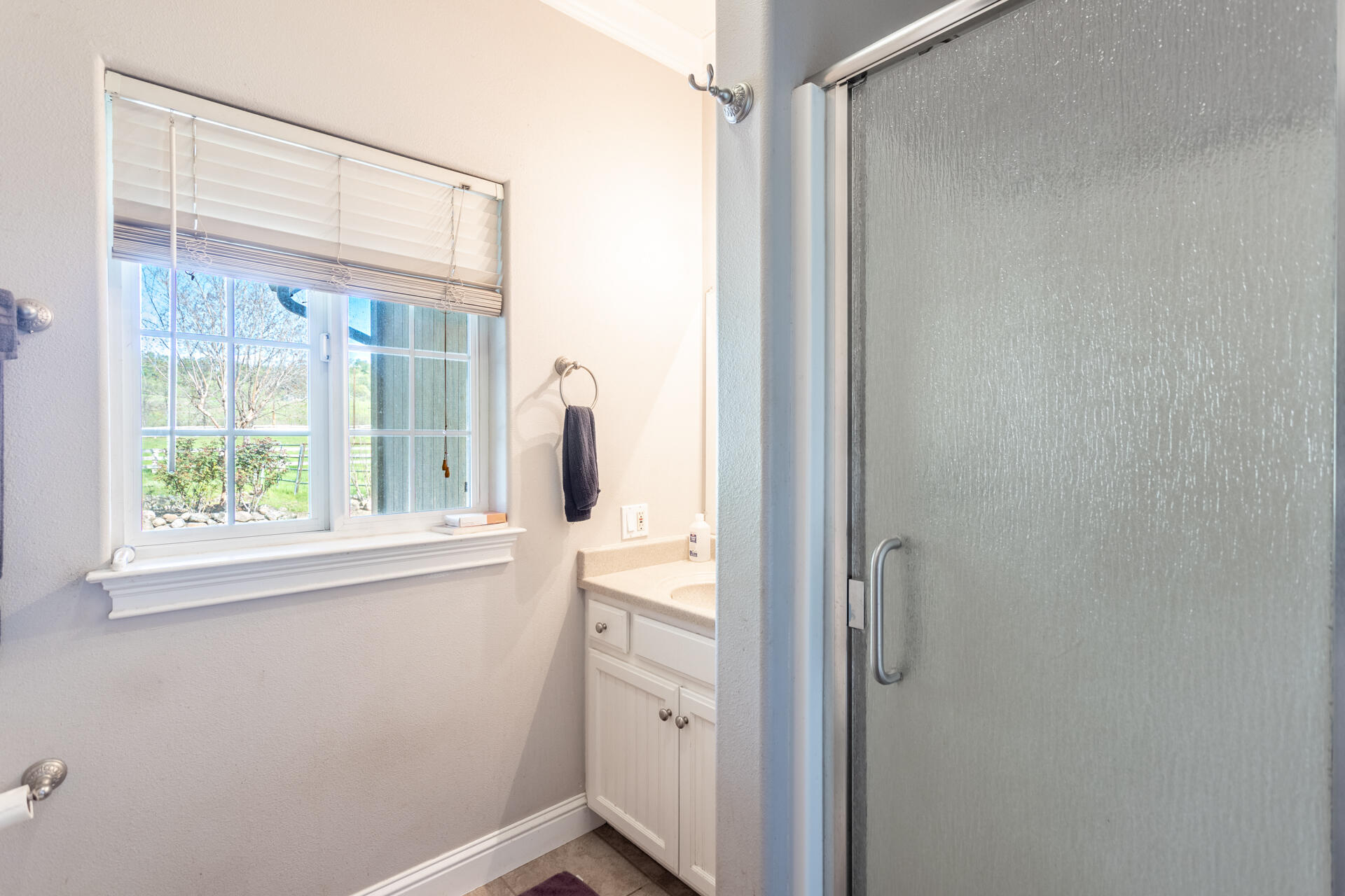 11847 Oak Run Road Oak Run, CA 96069 - Photo 26 of 54 a bathroom with a shower and a window