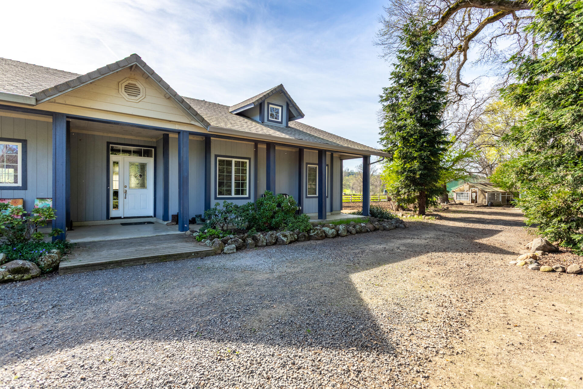 11847 Oak Run Road Oak Run, CA 96069 - Photo 5 of 54 a front view of a house with garden
