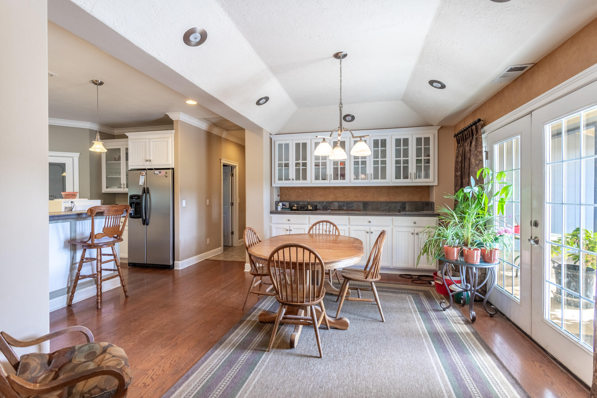 11847 Oak Run Road Oak Run, CA 96069 - Photo 10 of 54 a view of a dining room with furniture window and wooden floor