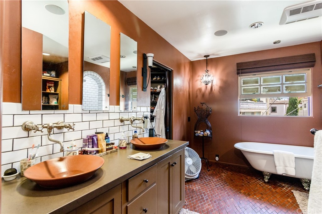 66 Corinthian Walk Long Beach, CA 90803 - Photo 19 of 26 a bathroom with a sink and a mirror