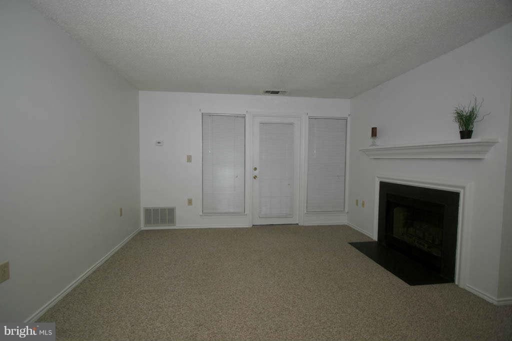 21013 Timber Ridge Terrace, Unit 203 Ashburn, VA 20147 - Photo 15 of 24 Living Room