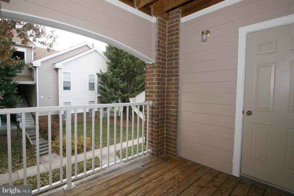 21013 Timber Ridge Terrace, Unit 203 Ashburn, VA 20147 - Photo 22 of 24 Exterior (Rear)