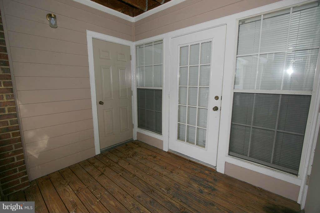 21013 Timber Ridge Terrace, Unit 203 Ashburn, VA 20147 - Photo 23 of 24 Exterior (Rear)