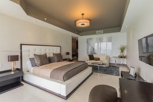 a bedroom with a bed and furniture