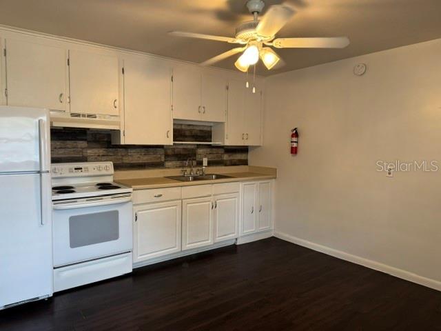 2075 Howell Branch Road, Unit 101 Maitland, FL 32751 - Photo 5 of 9 a kitchen with stainless steel appliances a white stove top oven a sink and dishwasher