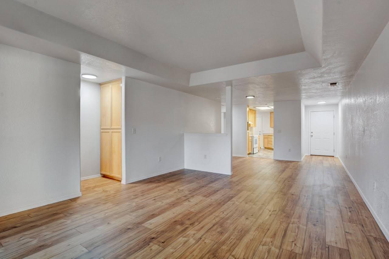 417 Crystal Drive Eagle Point, OR 97524 - Photo 10 of 35 a view of a hallway with wooden floor
