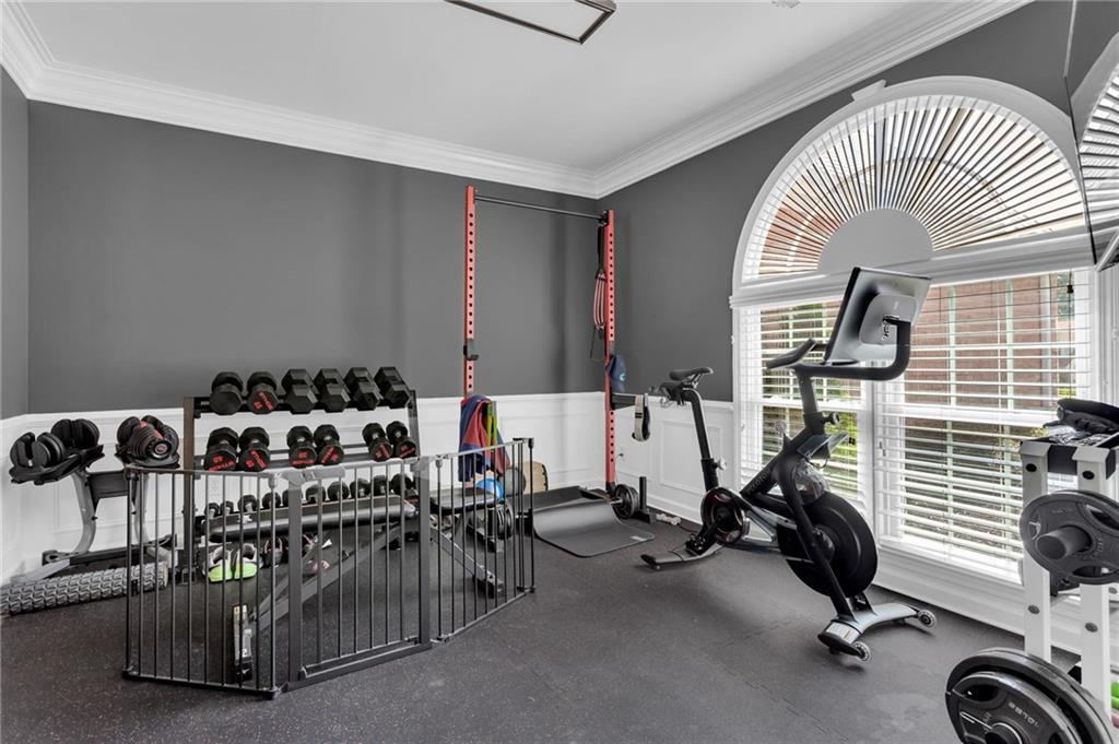145 Springfield Creek Road Alpharetta, GA 30004 - Photo 13 of 27 a view of a room with gym equipment