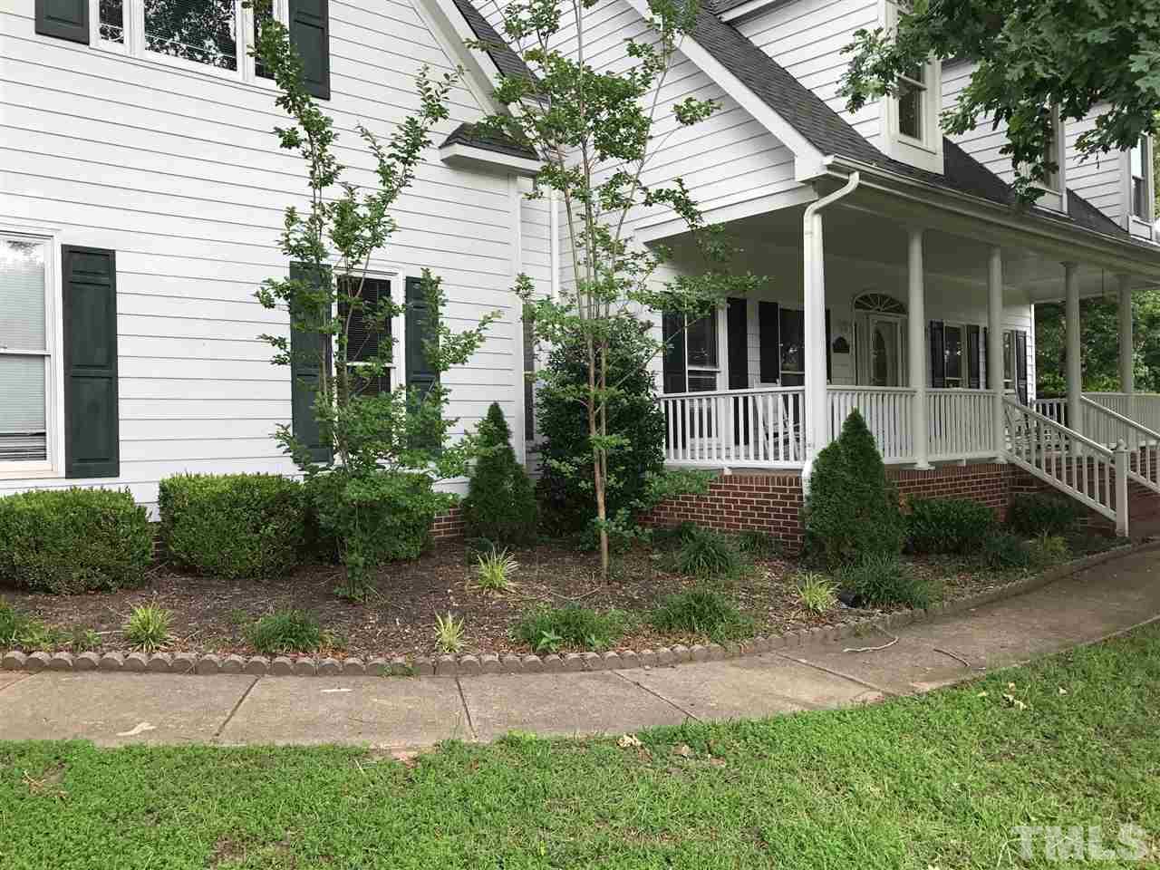 1432 Turner Farms Road Garner, NC 27529 - Photo 25 of 25 a front view of a house with garden