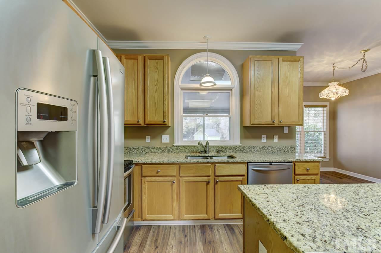 1432 Turner Farms Road Garner, NC 27529 - Photo 10 of 25 a kitchen with a sink and cabinets
