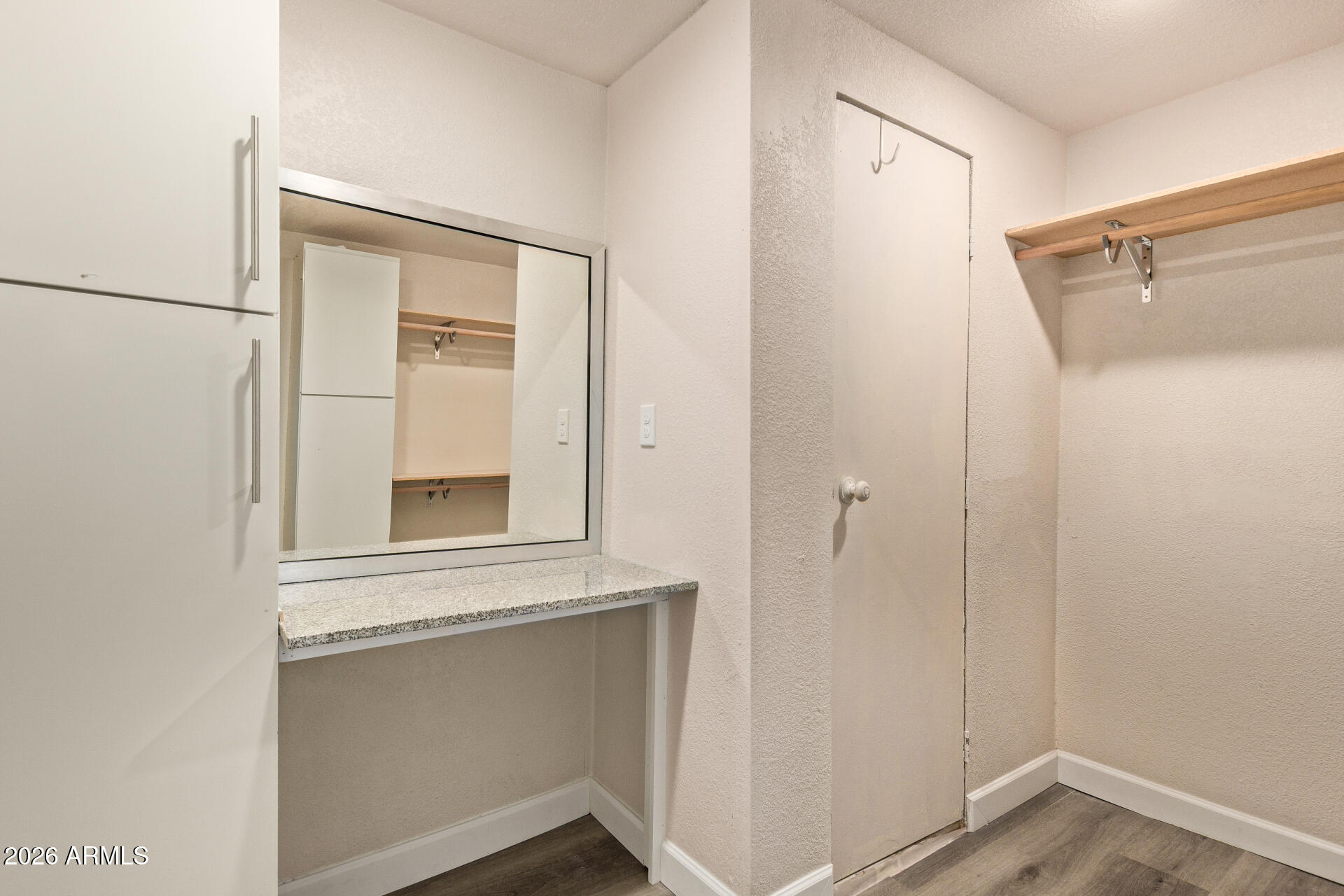 400 West Baseline Road, Unit 312 Tempe, AZ 85283 - Photo 27 of 32 a view of a small space with wooden floor and a window