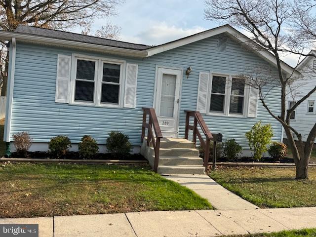289 C Street Carneys Point, NJ 08069 - Photo 19 of 19 a front view of a house with garden