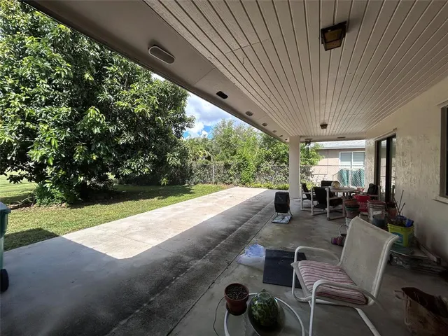 a lobby with furniture and garden