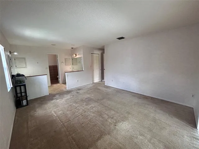 a view of a kitchen with a sink