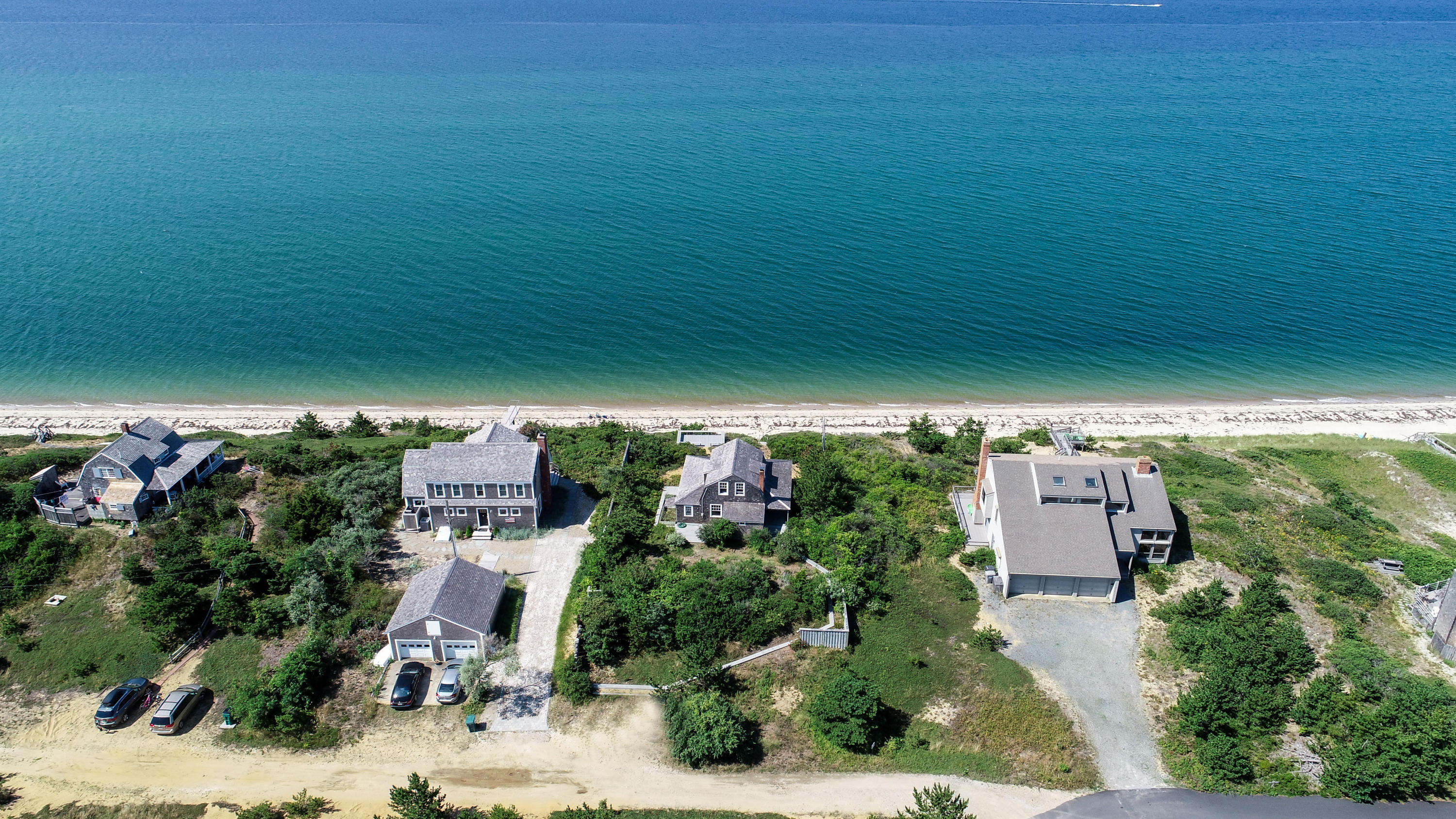 12 Pilgrims Path Truro, MA 02666 - Photo 18 of 25 an aerial view of a house with a yard
