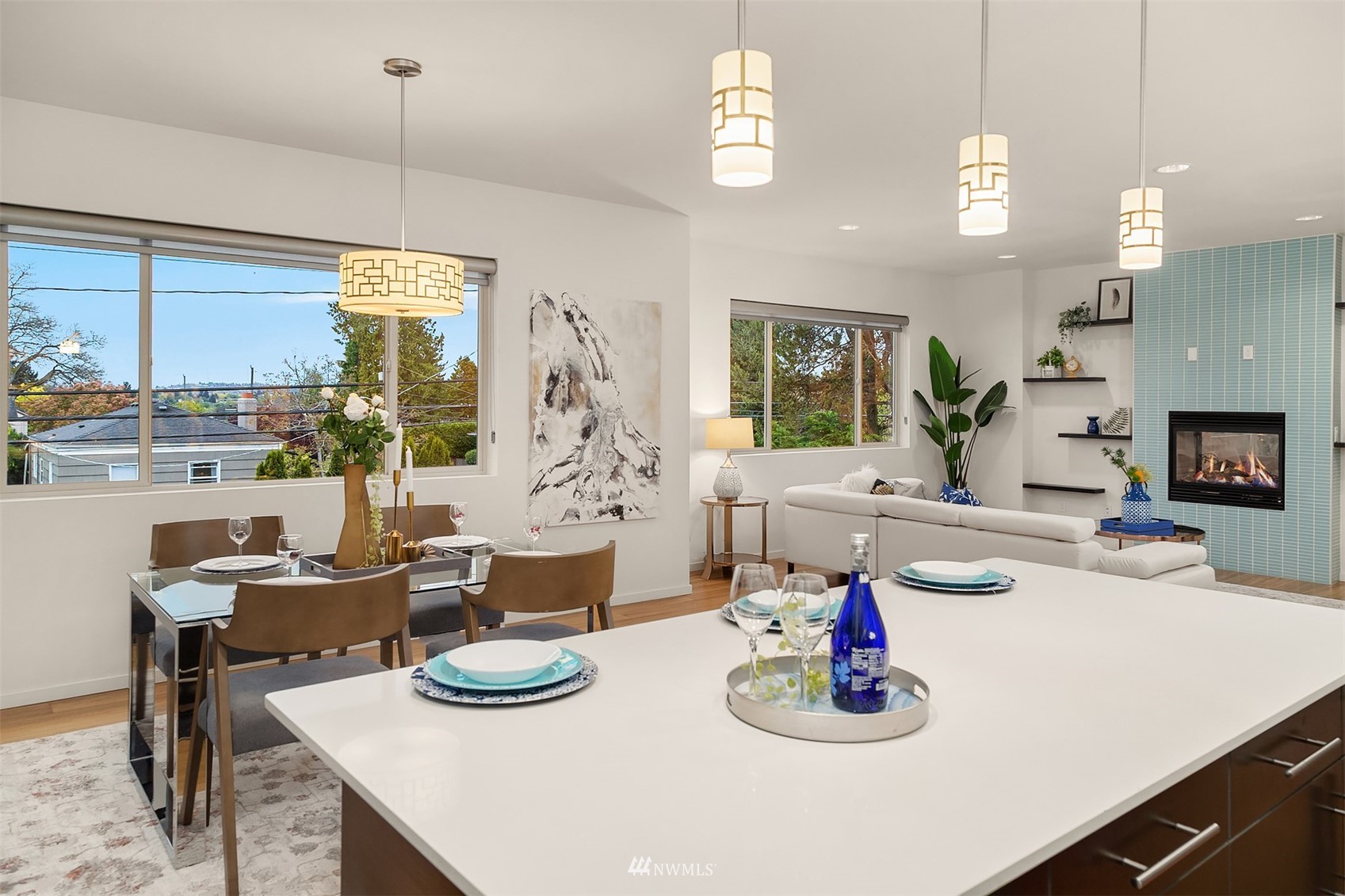 8000 Meridian Avenue North Seattle, WA 98103 - Photo 16 of 33 a kitchen with dining table and chairs