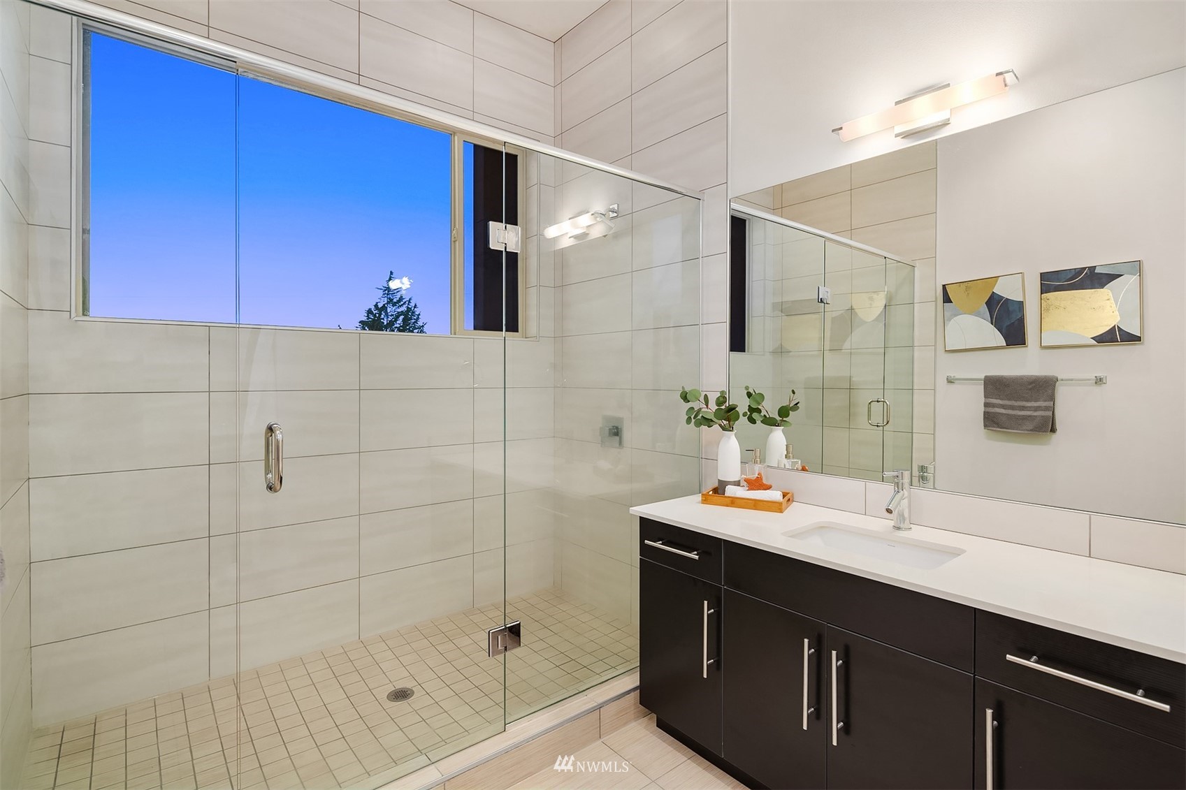8000 Meridian Avenue North Seattle, WA 98103 - Photo 20 of 33 a bathroom with a sink shower and a mirror