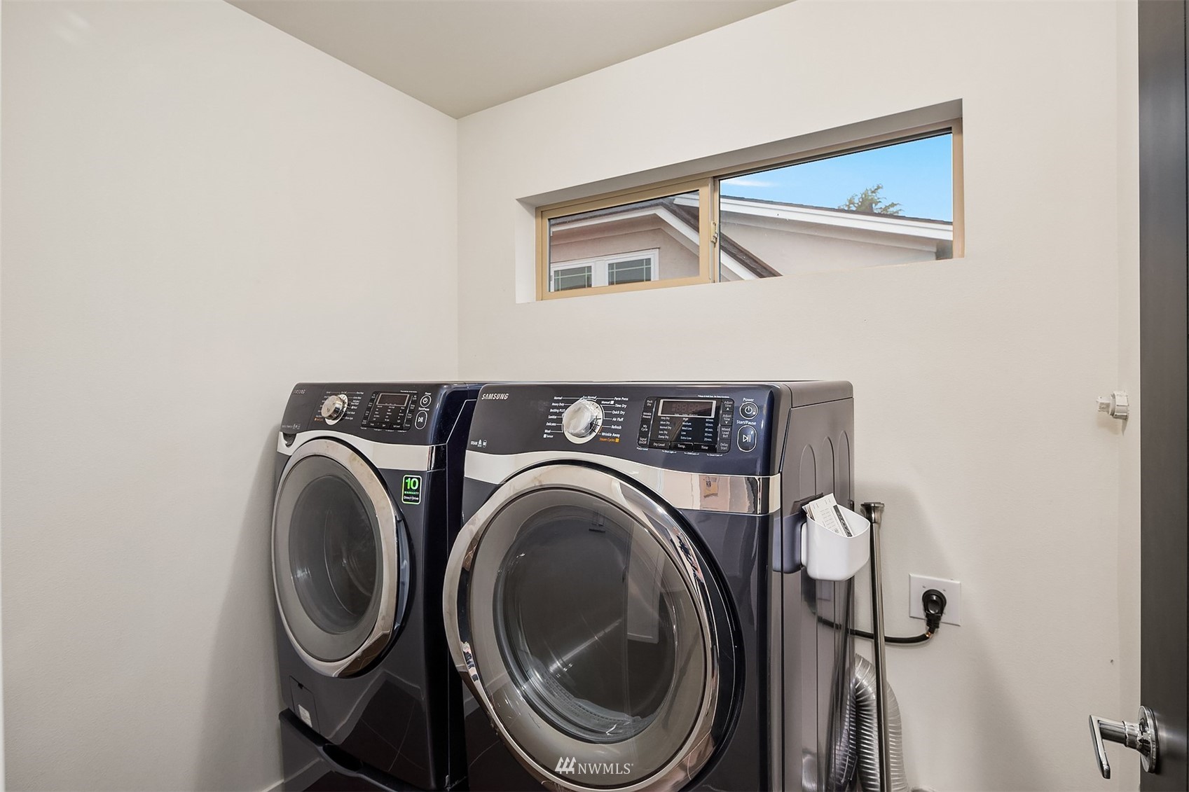 8000 Meridian Avenue North Seattle, WA 98103 - Photo 25 of 33 a utility room with dryer and washer