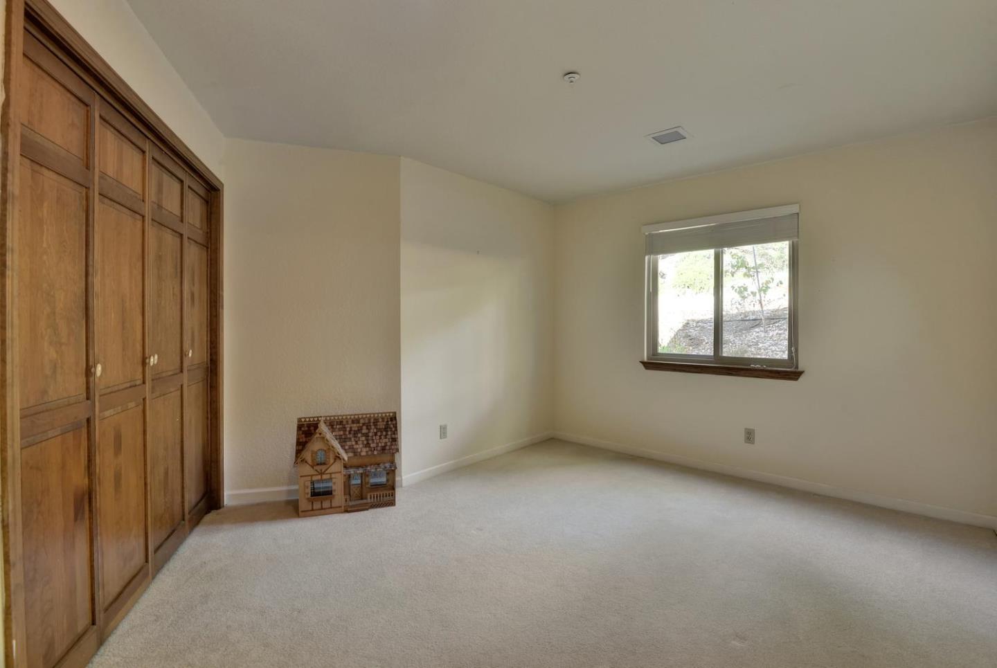 1737 Hecker Pass Road Gilroy, CA 95020 - Photo 20 of 27 an empty room with windows