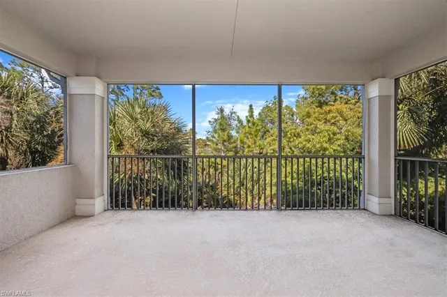 a view of a porch with a big yard