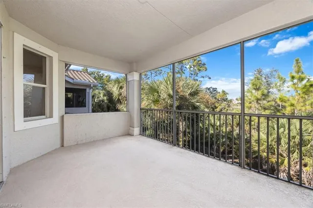 a view of balcony with furniture