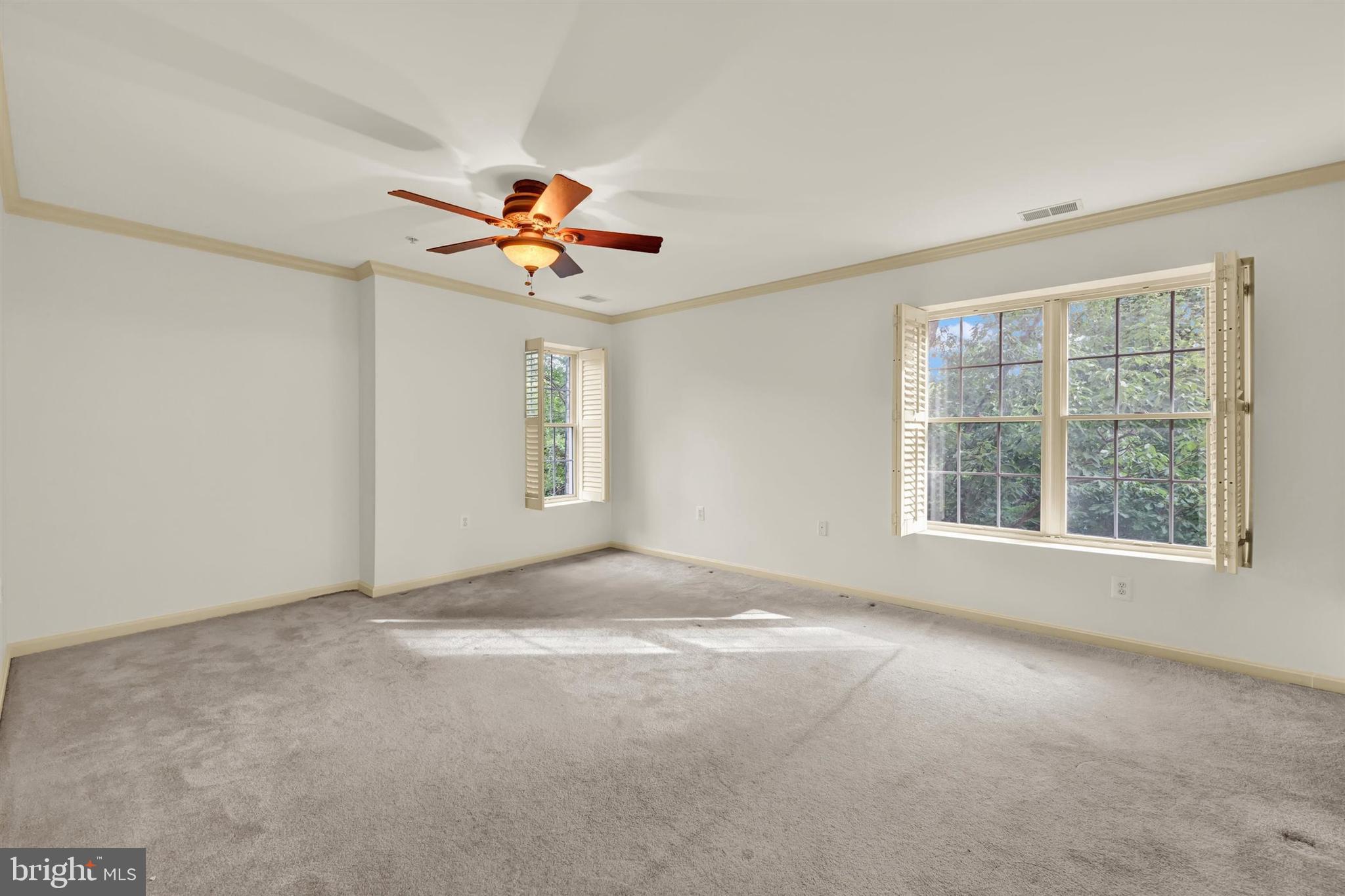 12021 Tralee Road, Unit 402 Lutherville-Timonium, MD 21093 - Photo 29 of 36 Primary Bedroom