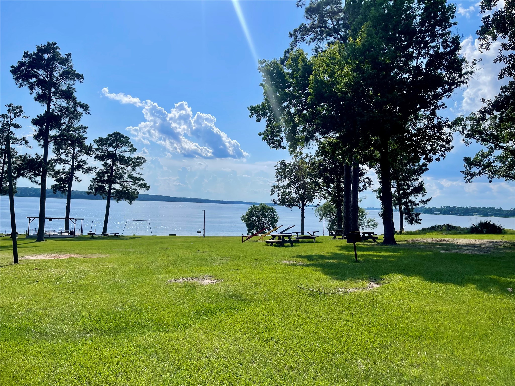 520 Lake Shore Drive Trinity, TX 75862 - Photo 10 of 19 a view of a golf course with a house