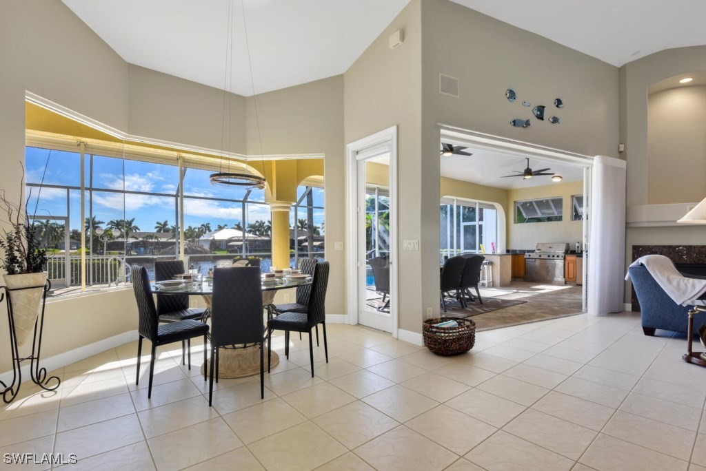 2810 Southwest 49th Terrace Cape Coral, FL 33914 - Photo 11 of 33 a living room with furniture large window and glass door