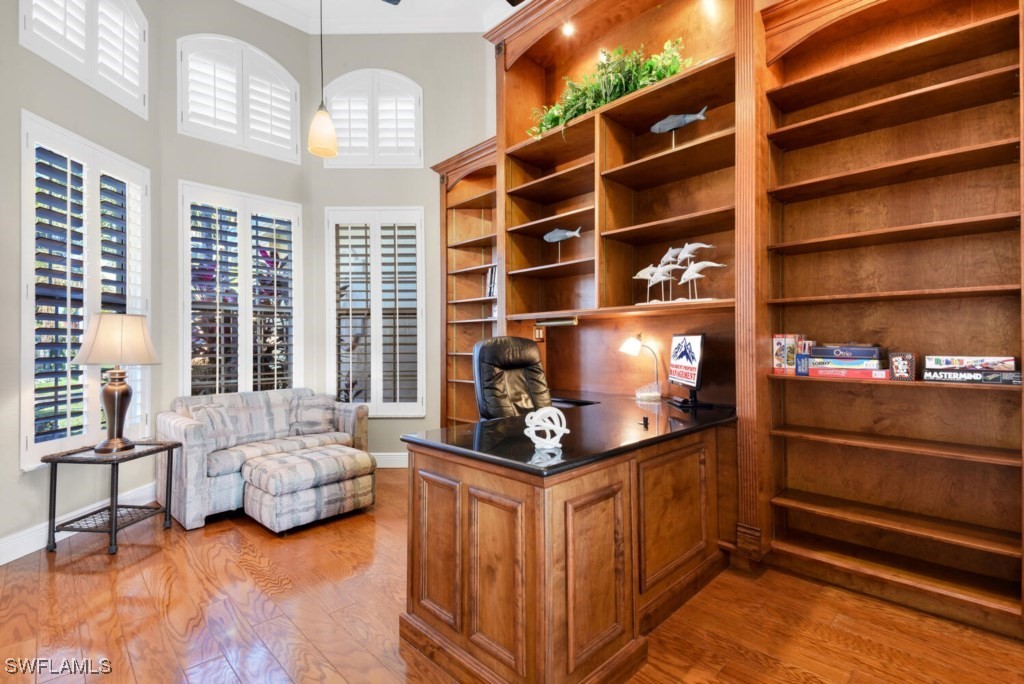 2810 Southwest 49th Terrace Cape Coral, FL 33914 - Photo 13 of 33 a dining room with furniture and a chandelier