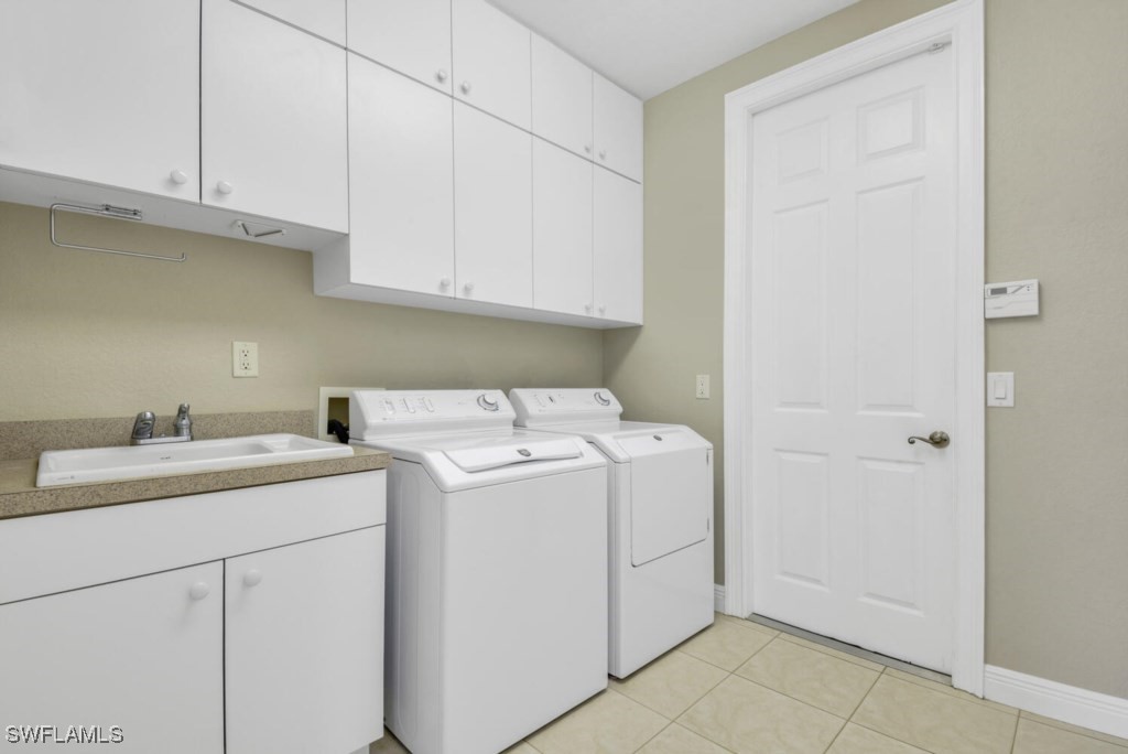 2810 Southwest 49th Terrace Cape Coral, FL 33914 - Photo 21 of 33 a utility room with dryer and washer