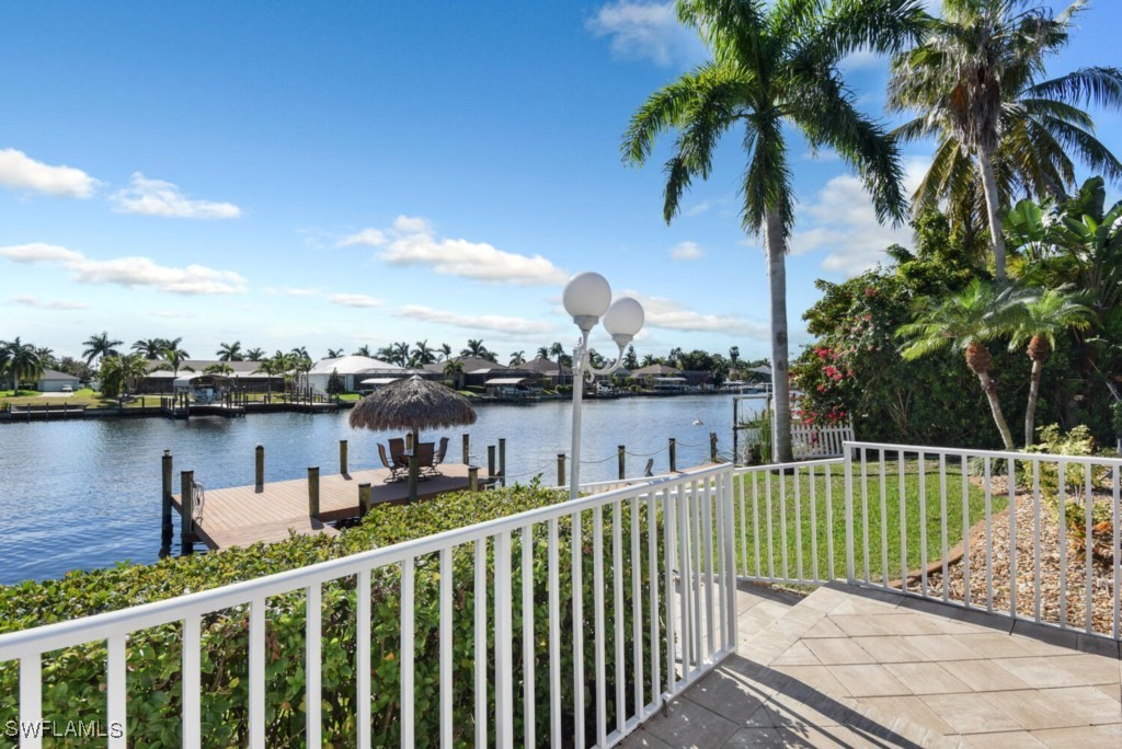 2810 Southwest 49th Terrace Cape Coral, FL 33914 - Photo 25 of 33 a view of a roof deck with palm trees